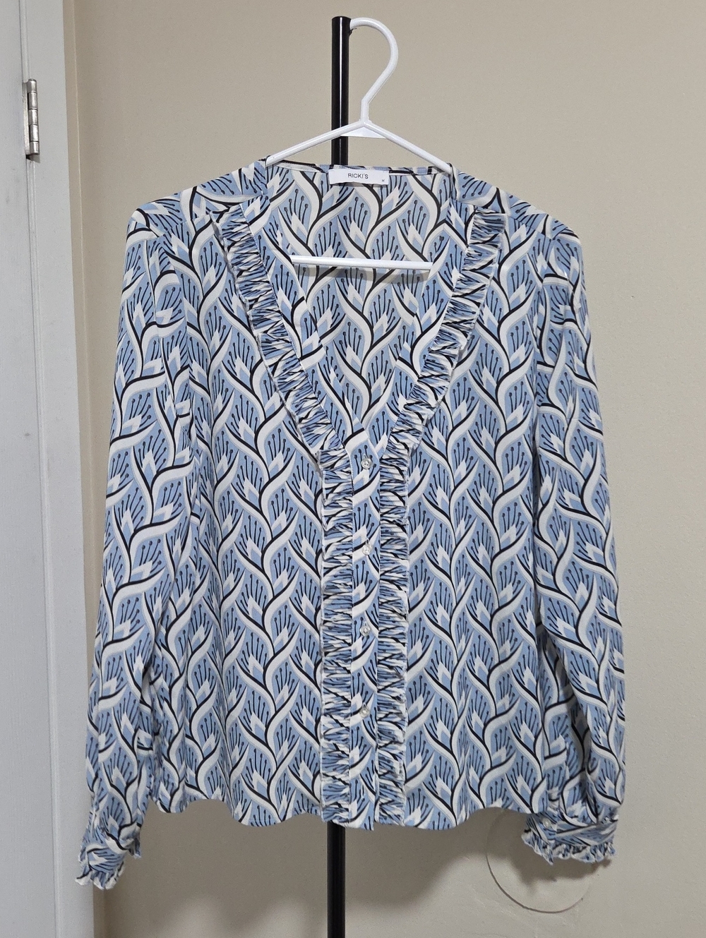 Ricki's Blue and White Leaf Ruffle-Front Blouse